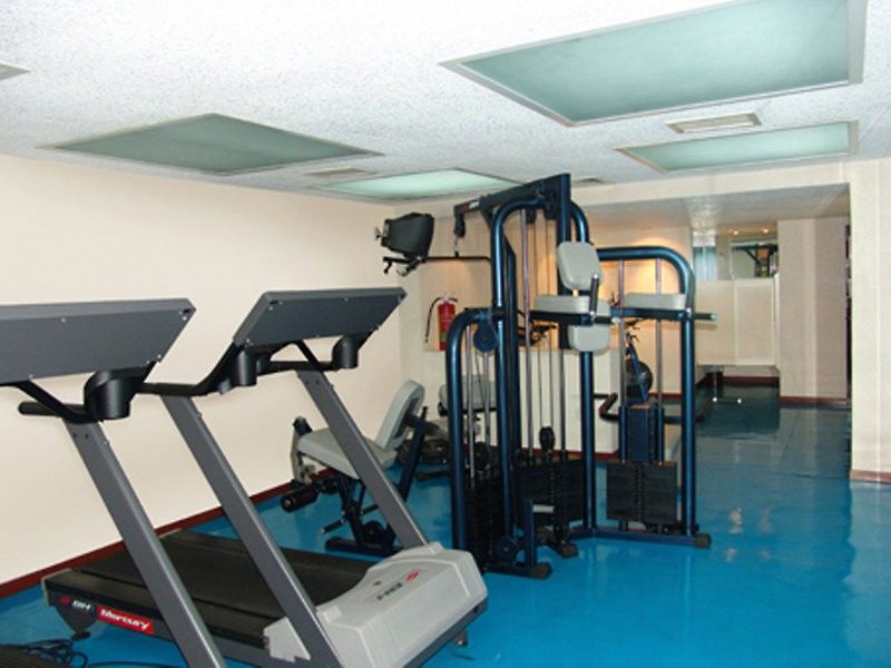 Exe Suites San Marino Мехико Экстерьер фото The gym at the hotel