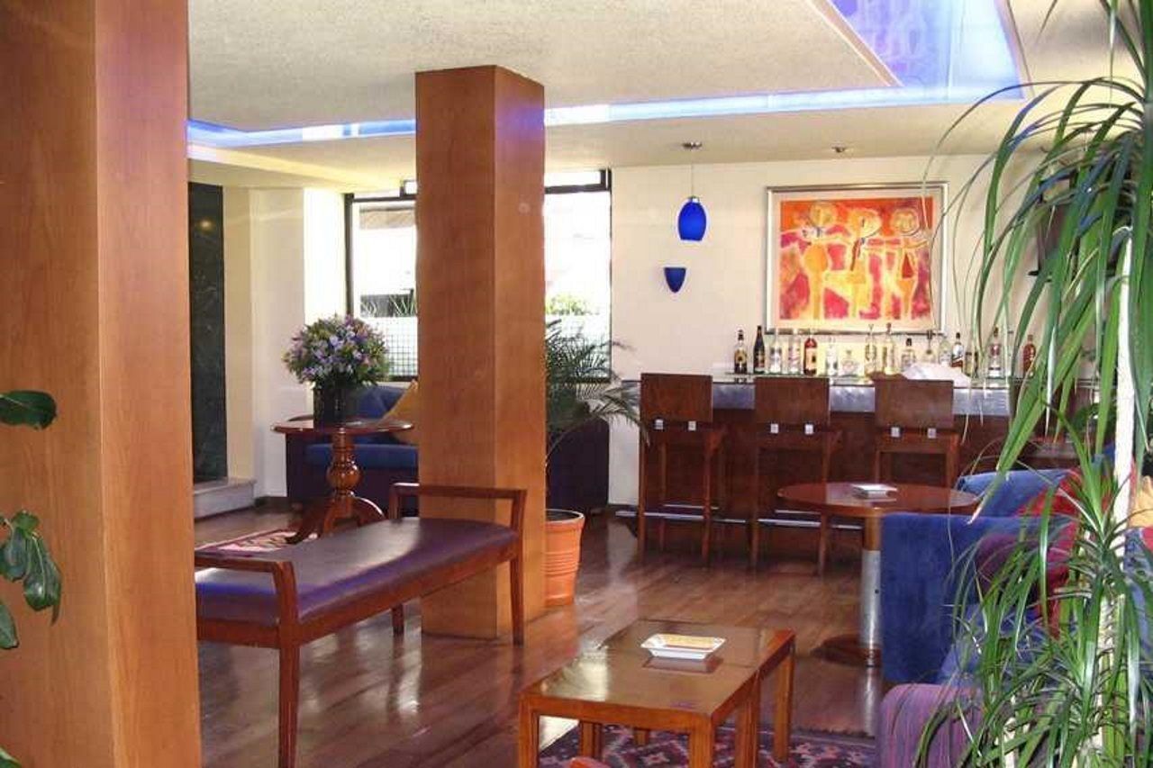 Exe Suites San Marino Мехико Экстерьер фото The lounge at the airport